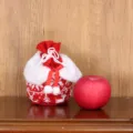 Weihnachtliche Strick-Geschenktüte für Apfel und Süßigkeiten in Rot-Weiß für Feste. - Rot