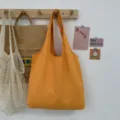 Einfarbige orangefarbene Canvas Tasche lässige Studenten Schultertasche minimalistische Handtasche - Orange