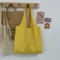 Einfarbige Segeltuch Tragetasche gelbe Schultertasche laessige einfache Tasche fuer Alltag Studenten - Gelb