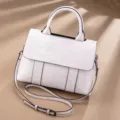 White leather women handbag with crocodile pattern flap, stylish top handle shoulder bag. - White