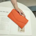Orange leather long wallet for women, elegant envelope design with snap closure. Premium texture. - 19x10x3.5cm / Orange