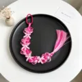 Kids wig braid hair accessory with pink bows and pearls, detailed view for cute girls styling. - Style 3