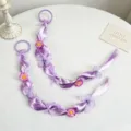 Detail view of purple braided hair extensions with cute flowers and bows for girls. - Purple Butterfly Bubble Braids One Pair
