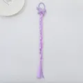 Kids braided hair extension with cute purple unicorn hair tie, perfect for styling. - Style 3