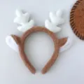 Joli serre-tête en peluche avec bois de renne marron et blanc, idéal pour Noël et look mignon. - Bois Clairs