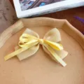 Pince à cheveux noeud papillon jaune ruban mignon pour femmes filles accessoire cheveux - Style d'accessoire / Jaune