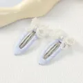 Bonitas horquillas de tela azul claro con lazos de perlas delicados para el peinado infantil. - Lazo / 1 Par / Azul