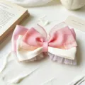Detail view of the French retro sweet pink and white layered mesh bow hair clip accessory. - 2# Pink Bowknot Hair Clip