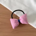 Vue détaillée chouchou nœud vichy rose, accessoire cheveux en tissu mignon pour queues. - Chouchou Nœud Carreaux Rose