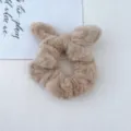 Plush rabbit ear hair scrunchie detail shot, cute fuzzy pony tail holder for autumn and winter. - Khaki