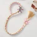 Cerchietto per capelli intrecciati biondi da bambina con fiocco di neve in strass rosa e fiocco. - Treccia Cerchietto Rosa