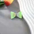 Detailed shot of a cute green glitter bow hair clip with laser translucent design for girls. - DIY Material (Without Clip) / Green