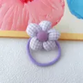 Purple gingham fabric flower hair tie detail shot, cute five petal scrunchie accessory. - Purple