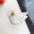 Pince à cheveux licorne ailes d'ange scintillantes pour enfants, vue de détail. - Barrette Blanche