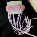 Sweet hair clips with cute peach decor, bows, and long pearl tassel ribbons for stylish looks. - Purple