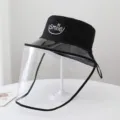 Black bucket hat with clear face shield, windproof and anti-oil splash design for kitchen use. - One Size (Head Circumference 54-58cm) / Double-Sided Black and White with Mask