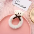 Detailed view of the cute plush bear hair tie, soft white fluffy material with a brown bow. - White Bowknot Bear + White Hair Tie