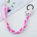 Close-up view of cute pink and purple gradient braided hair extension with sparkling unicorn charm. - No. 1
