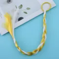 Detailed view of colorful synthetic hair braid extension with yellow and white strands and band. - Yellow And White
