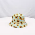 Charming sunflower print bucket hat in light blue, casual summer sun protection outdoor cap. - M (56-58cm) / Lake Blue
