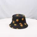 Black sunflower print bucket hat detail shot, stylish sun protection hat for outdoor wear. - One Size (55-58cm) / Style 4