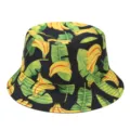 Primer plano detallado del tejido con estampado tropical de bananos y hojas del sombrero. - M (56-58cm) / Negro Plátano
