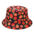 Stylish black bucket hat featuring a vibrant red strawberry all-over print for summer sun. - M (56-58cm) / Black Strawberry