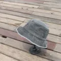 Classic vintage washed black bucket hat for men and women, casual outdoor sun hat fashion. - Black