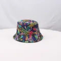 Colorful botanical leaf print bucket hat detail shot, showing vibrant fabric pattern and texture. - Retro Style 7