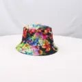 Close up view of the colorful floral print detail on the stylish casual bucket hat fabric. - Retro Style 5