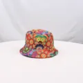 Close-up of colorful printed psychedelic pattern bucket hat fabric detail with vibrant floral art. - Retro Style 6