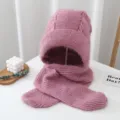 Pink knitted hat and scarf all-in-one, warm furry balaclava detail view for winter outdoor wear. - One Size / Pink