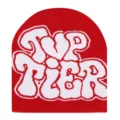 Red knit beanie with bold white letter design, warm winter streetwear cap for outdoor use. - Red