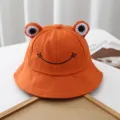 Cute orange frog cotton bucket hat with embroidered smile face and cute 3D eyes for outdoor sun. - Adjustable / Orange