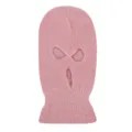 Pink knit three-hole balaclava detail view, showing warm winter windproof ski cap fabric. - Pink