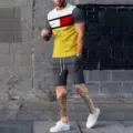Set abbigliamento sportivo casual da uomo con t-shirt e pantaloncini a blocchi di colore - Taglia M / Top e Pantaloni / Top giallo e pantaloni grigio scuro