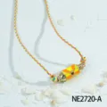 Colorful braided rope hexagonal pendant necklace with enamel details and red heart charm. - Orange and Yellow Hexagonal Prism Evil Eye Style (NE2720-A)