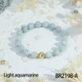Light aquamarine beaded bracelet with gold spacer beads, faceted gemstone jewelry for women. - Aquamarine