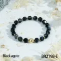 Faceted black agate beaded bracelet with gold center bead, vintage style stackable jewelry. - Black Agate