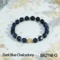 Dark blue faceted chalcedony beaded bracelet with gold spacer beads and central gold ball. - Dark Blue Chalcedony