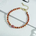 Rotes Perlenarmband mit goldenen Akzenten und Verlängerungskette, eleganter Modeschmuck. - Armband mit roten Achatperlen / Nur Armband