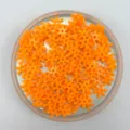 Orange plastic snowflake beads detail shot, perfect for DIY phone case and nail art design. - Orange Red