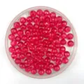 Detailed view of pink faceted acrylic globe beads, perfect for DIY jewelry and crafts. - 6mm / Rose Red