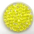 Detail shot of yellow transparent square faceted acrylic loose beads for DIY handmade jewelry craft. - 6mm / Yellow