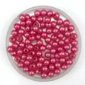 Pink ABS imitation pearl beads detail shot, glossy finish for DIY jewelry crafting. - Rose Red