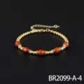 Goudkleurige kralenarmband met rode gefacetteerde edelsteenaccenten en verlengketting. - Rode Jaspis (BR2099-A-4)