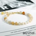 Boheemse halfedelstenen kralen armband met parels en goudkleurige metalen accenten. - Topaas Stijl (BR2175-H)