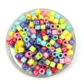 Close-up of colorful acrylic square alphabet beads in a clear tray, perfect for DIY jewelry. - 6*6mm / Light Colorful Background with White Letters