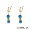 Pendientes colgantes dorados con cuentas de piedra natural azul y detalles de cristal. - Pendientes De Apatita Larimar