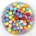 Close-up view of colorful acrylic dotted beads for DIY jewelry making and crafts details. - 8mm / Multicolor